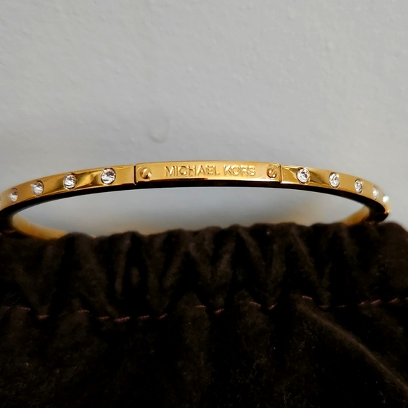 Michael Kors Women’s Gold Tone Hinged Bangle Bracelet with Crystal Accen… - Picture 1 of 6